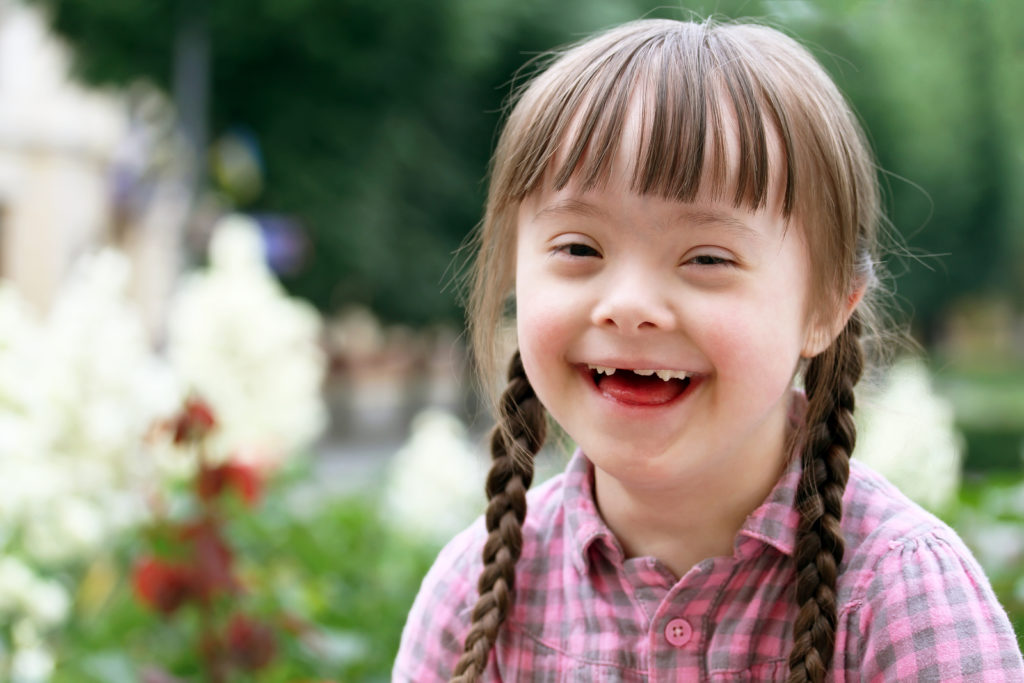 Portrait of beautiful young girl smiling in park Portrait of beautiful young girl smiling in park
