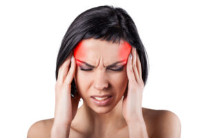 Girl with a painful head on a white background Girl with a painful head on a white background